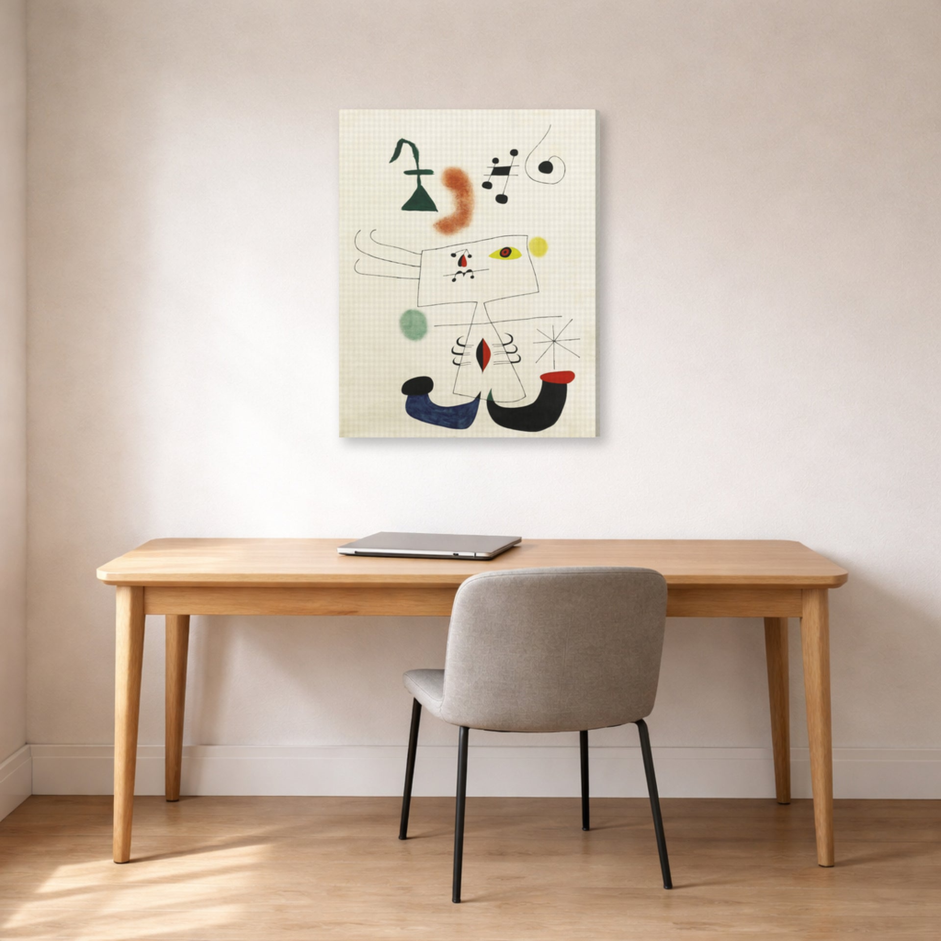 Gallery-wrapped canvas print of Joan Miró's 'Emme Revant De L'evasion' displayed on a wall in a office