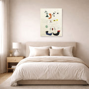 Unframed poster print of Joan Miró's 'Emme Revant De L'evasion' displayed on a wall in a bedroom