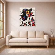 Unframed poster print of Joan Miró's 'Fundacao Calouste Gulbenkian' displayed on a wall in a living room