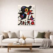 Unframed poster print of Joan Miró's 'Fundacao Calouste Gulbenkian' displayed on a wall in a living room