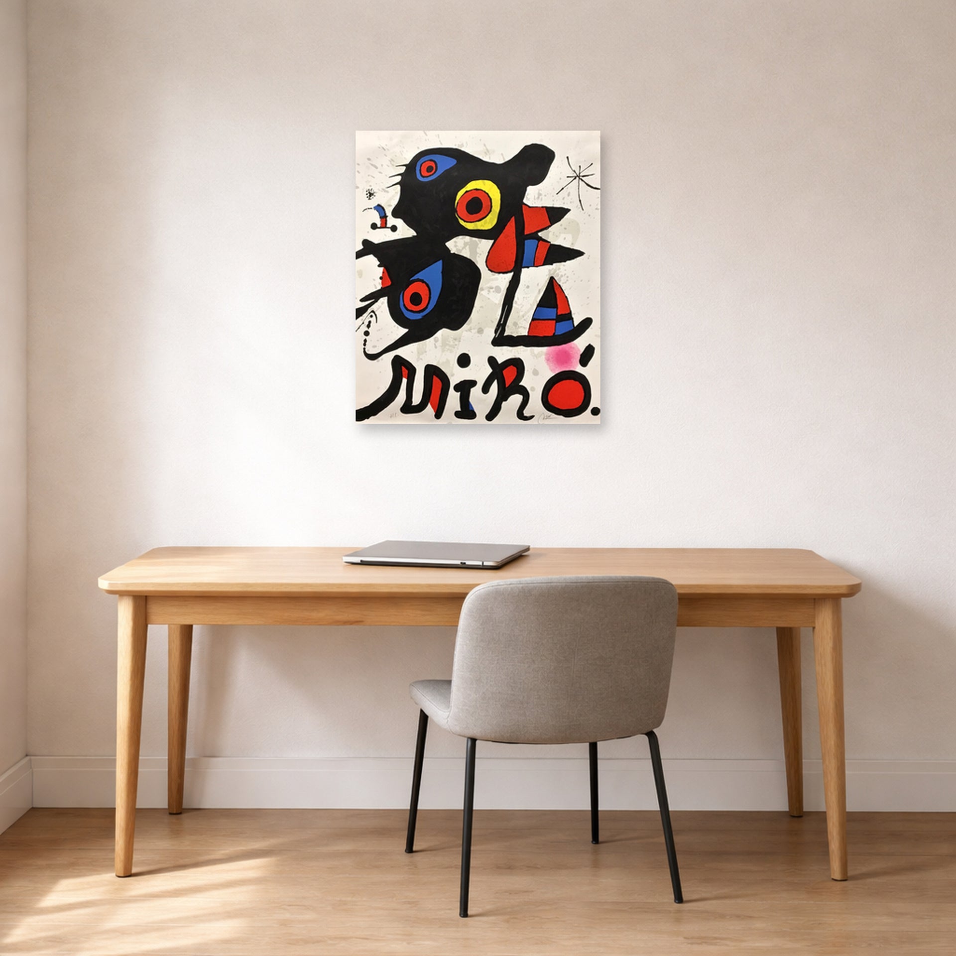 Unframed poster print of Joan Miró's 'Fundacao Calouste Gulbenkian' displayed on a wall in a office