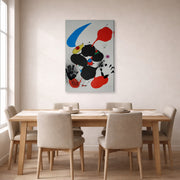 Gallery-wrapped canvas print of Joan Miró's 'Godalla' displayed on a wall in a dining room