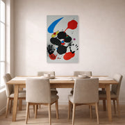 Unframed poster print of Joan Miró's 'Godalla' displayed on a wall in a dining room