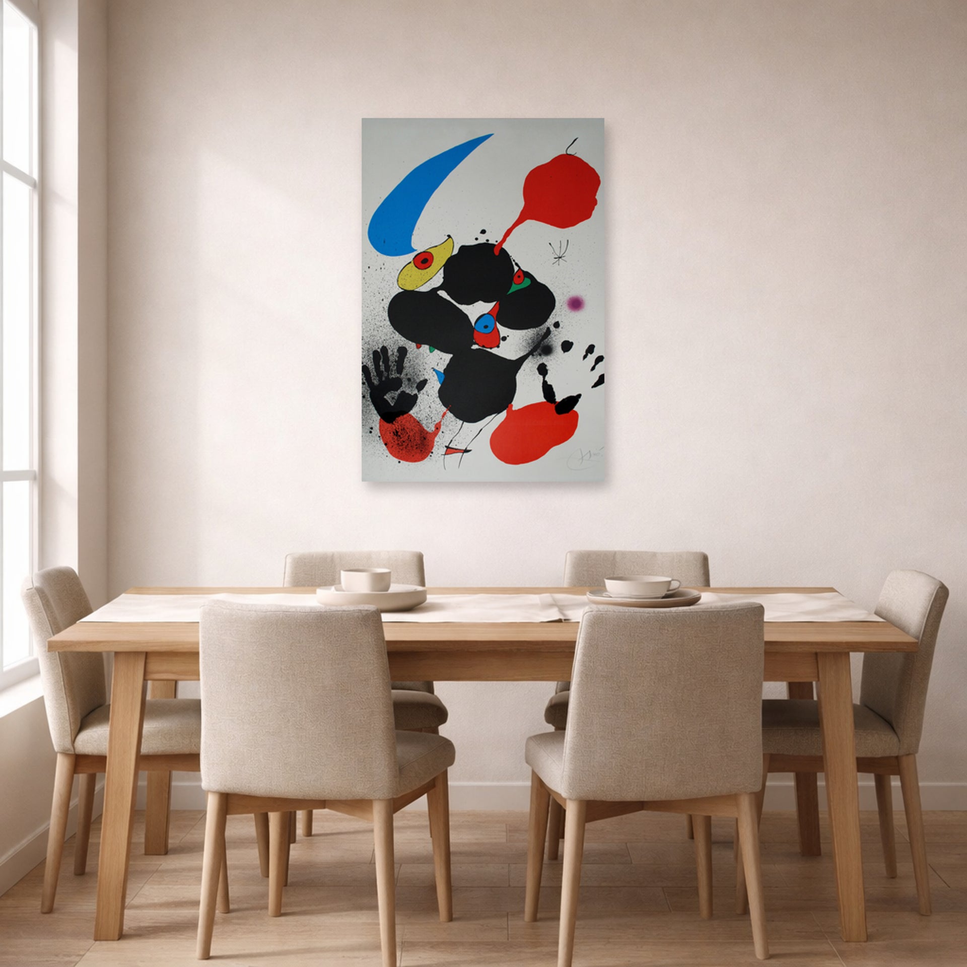 Unframed poster print of Joan Miró's 'Godalla' displayed on a wall in a dining room