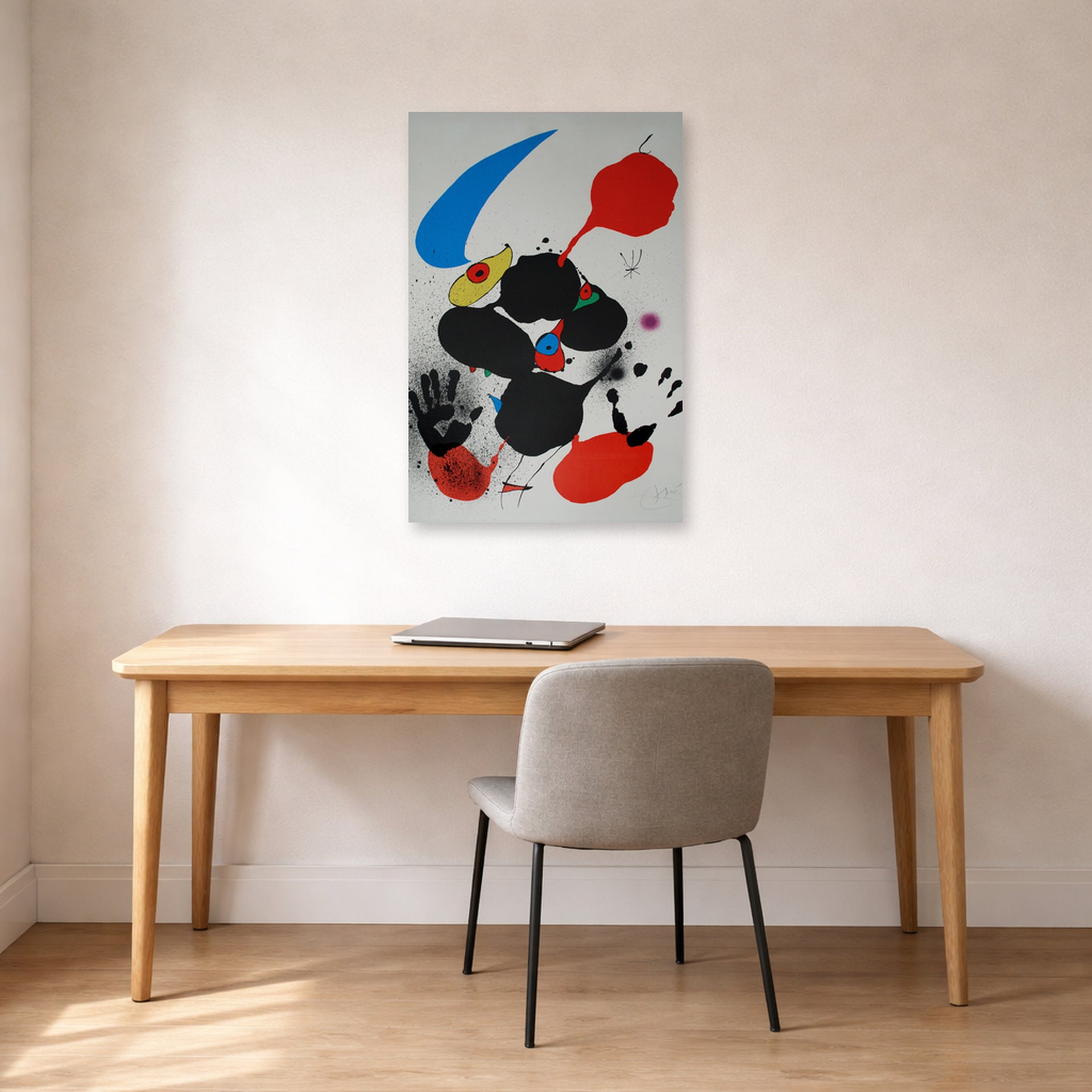 Unframed poster print of Joan Miró's 'Godalla' displayed on a wall in a office