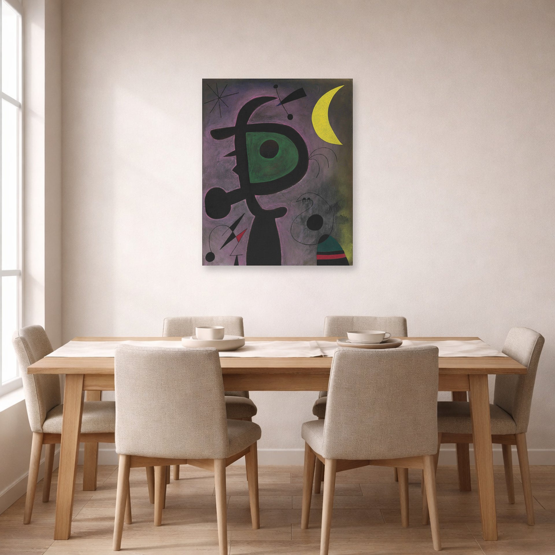 Unframed poster print of Joan Miró's 'L'arete Rouge Transperce Les Plumes Bleues De L'oiseau Au Pale Bec' displayed on a wall in a dining room