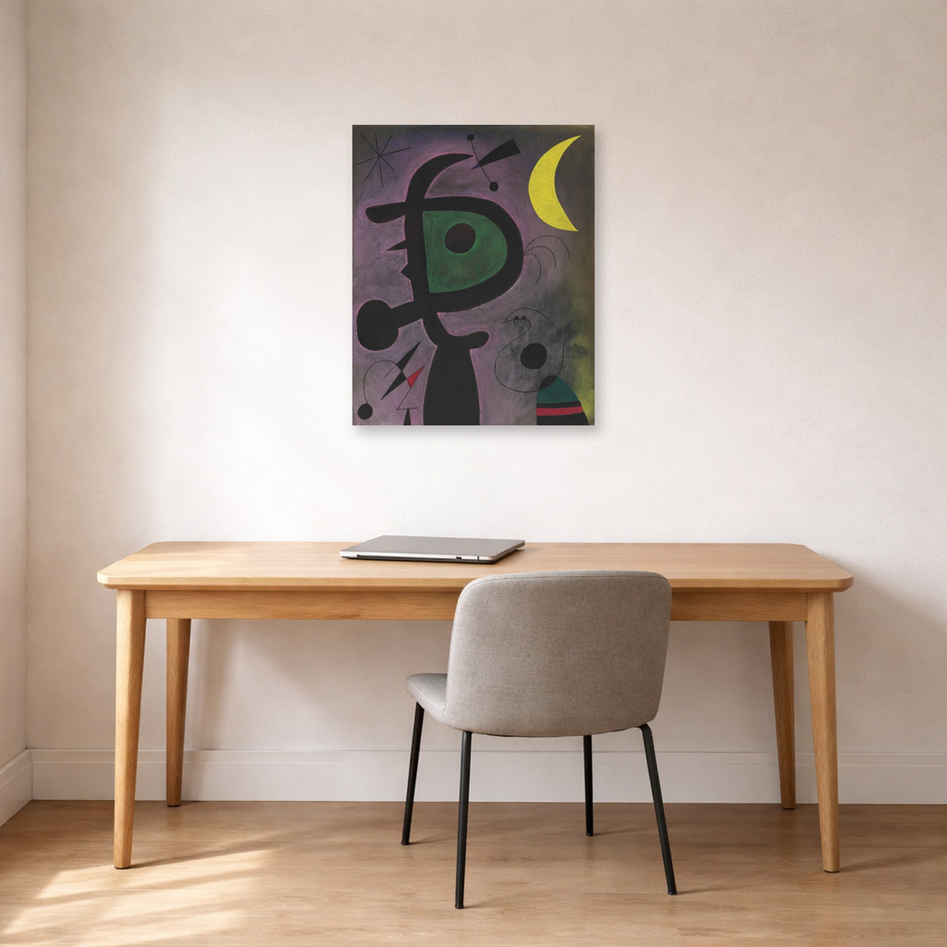 Unframed poster print of Joan Miró's 'L'arete Rouge Transperce Les Plumes Bleues De L'oiseau Au Pale Bec' displayed on a wall in a office