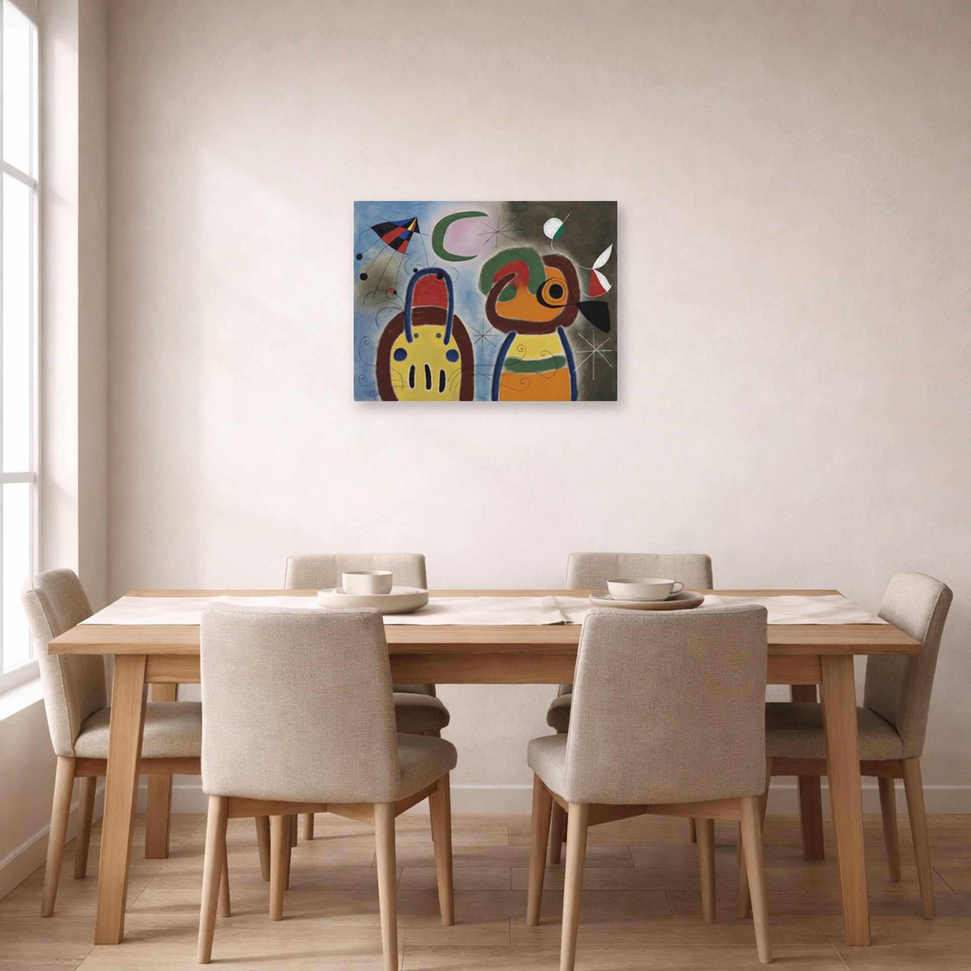 Unframed poster print of Joan Miró's 'L'oiseau Au Plummage Deploye' displayed on a wall in a dining room