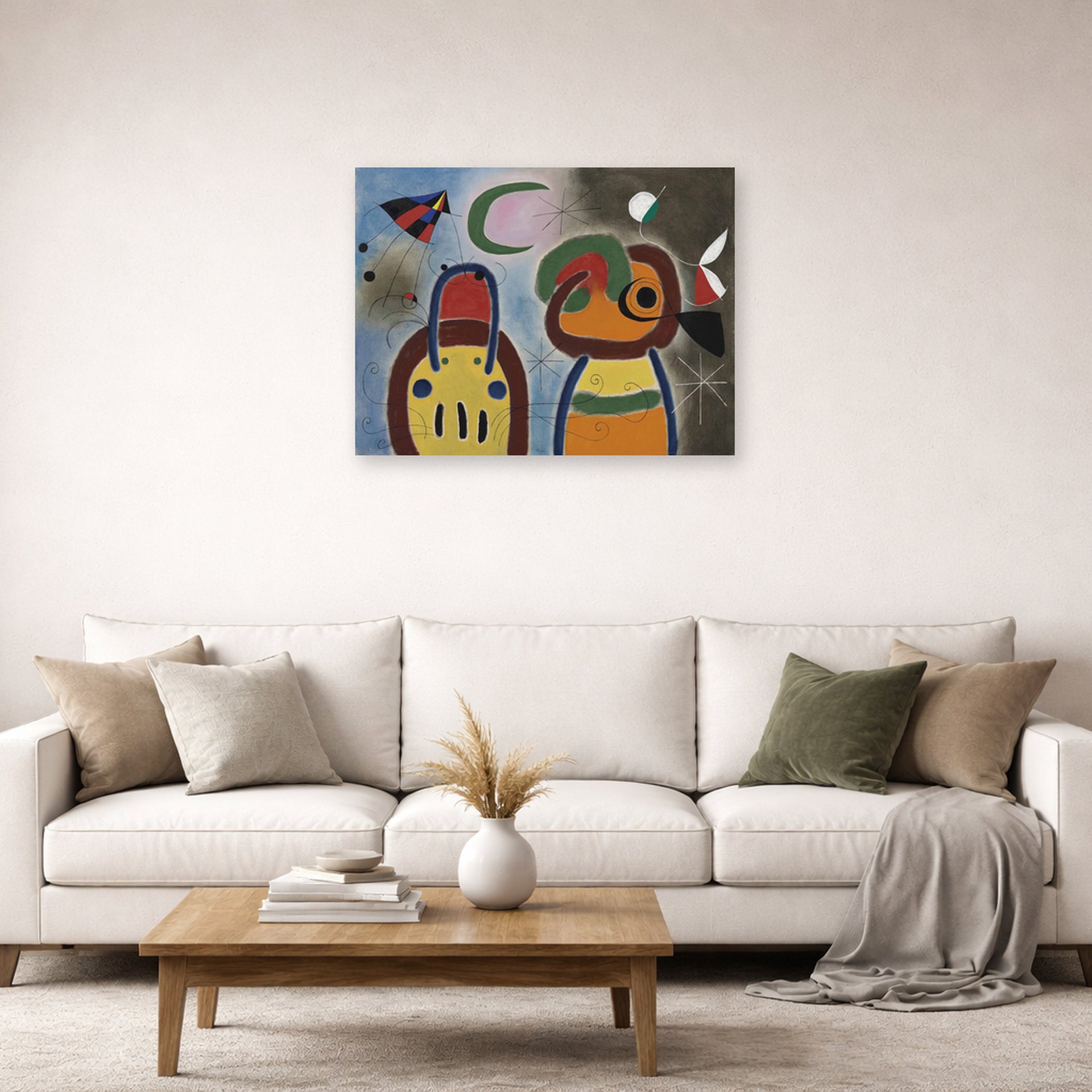 Unframed poster print of Joan Miró's 'L'oiseau Au Plummage Deploye' displayed on a wall in a living room