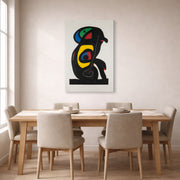 Gallery-wrapped canvas print of Joan Miró's 'La Brahmane' displayed on a wall in a dining room