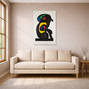 Unframed poster print of Joan Miró's 'La Brahmane' displayed on a wall in a living room
