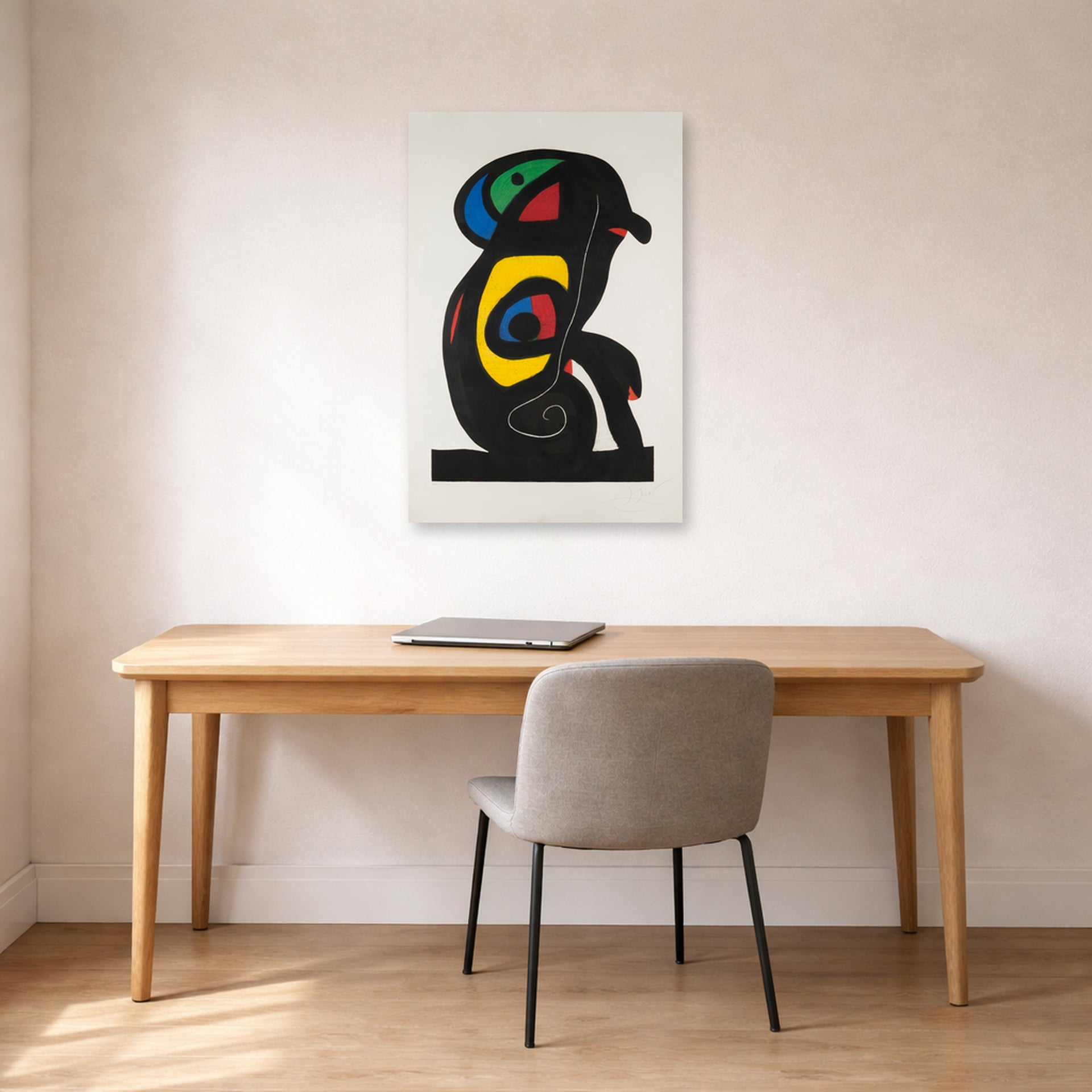 Unframed poster print of Joan Miró's 'La Brahmane' displayed on a wall in a office