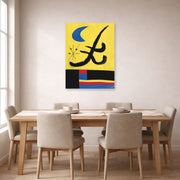 Unframed poster print of Joan Miró's 'La Lune Bleue' displayed on a wall in a dining room