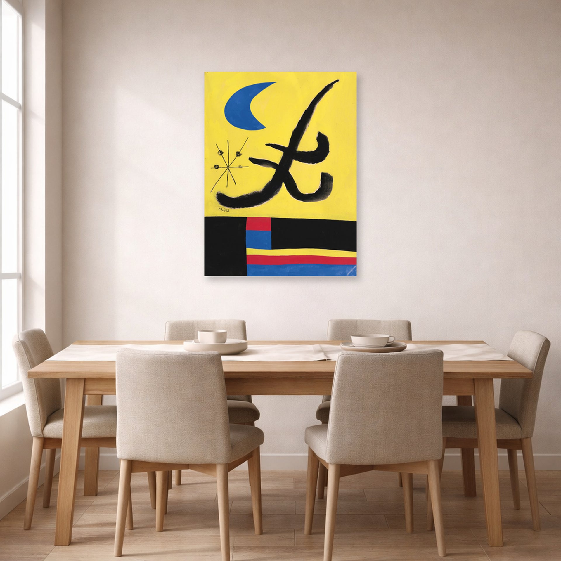 Unframed poster print of Joan Miró's 'La Lune Bleue' displayed on a wall in a dining room