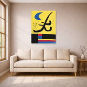 Unframed poster print of Joan Miró's 'La Lune Bleue' displayed on a wall in a living room