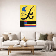 Unframed poster print of Joan Miró's 'La Lune Bleue' displayed on a wall in a living room