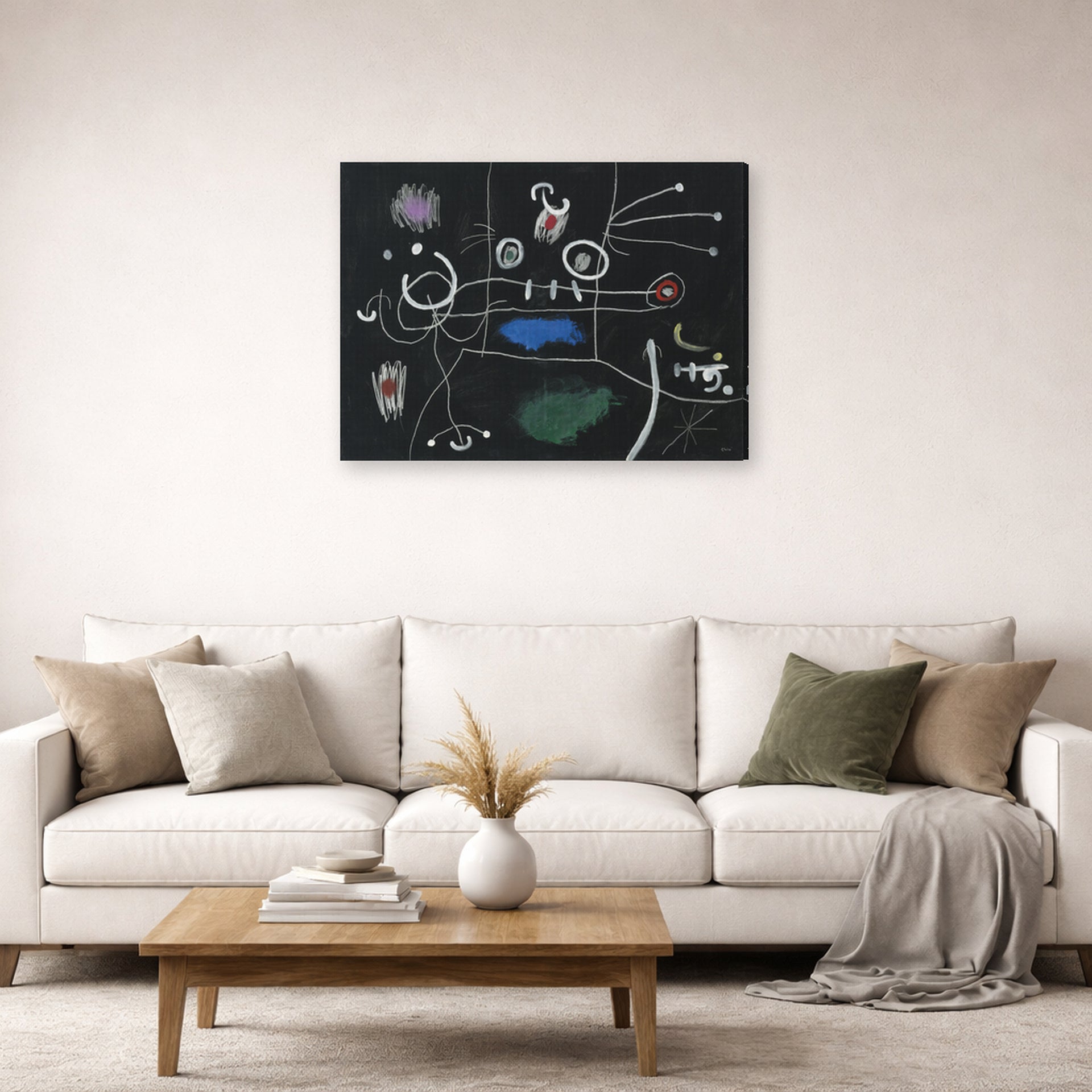 Gallery-wrapped canvas print of Joan Miró's 'Le Mangeur De Gigot' displayed on a wall in a living room