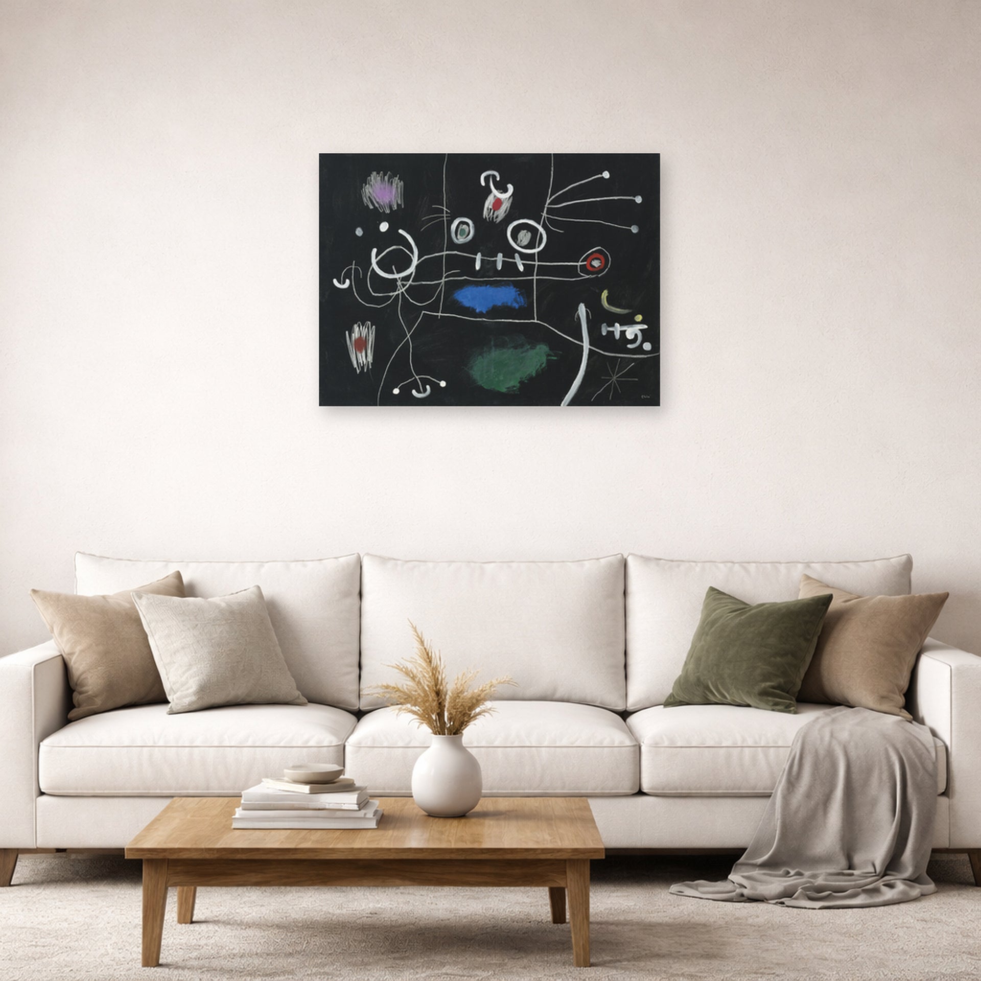 Unframed poster print of Joan Miró's 'Le Mangeur De Gigot' displayed on a wall in a living room
