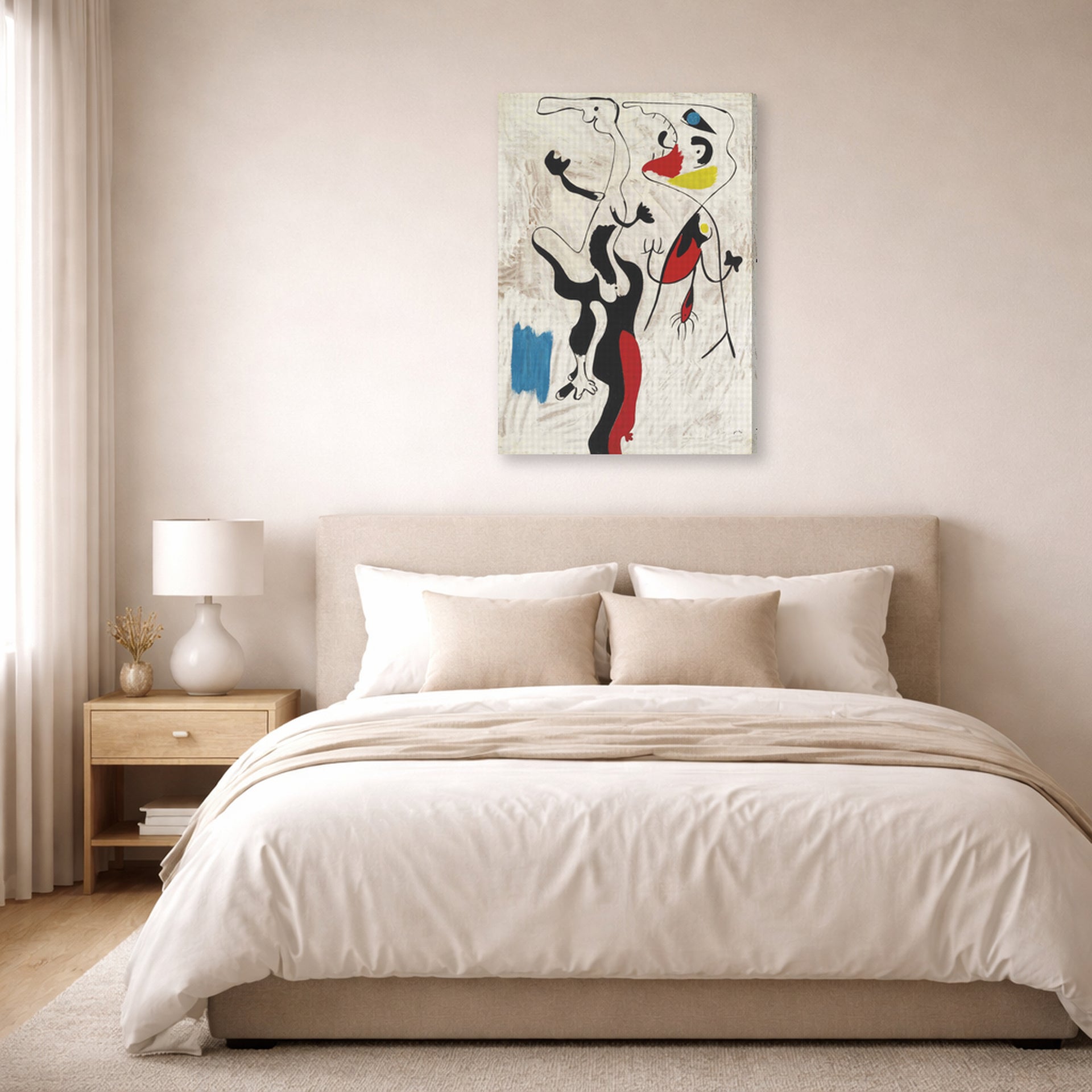 Gallery-wrapped canvas print of Joan Miró's 'Man and Woman' displayed on a wall in a bedroom
