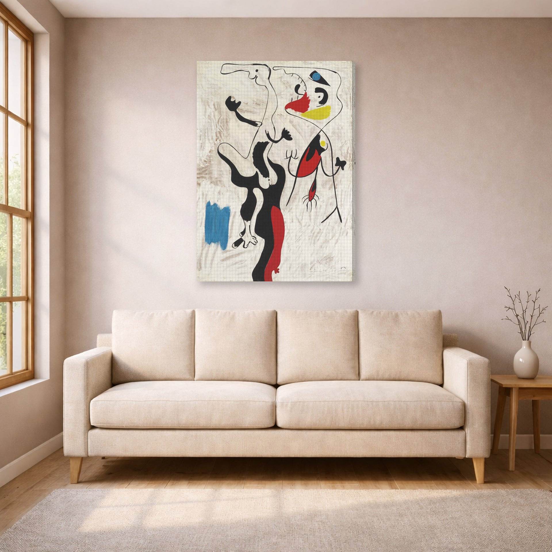 Gallery-wrapped canvas print of Joan Miró's 'Man and Woman' displayed on a wall in a living room