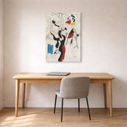 Gallery-wrapped canvas print of Joan Miró's 'Man and Woman' displayed on a wall in a office