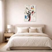 Unframed poster print of Joan Miró's 'Man and Woman' displayed on a wall in a bedroom