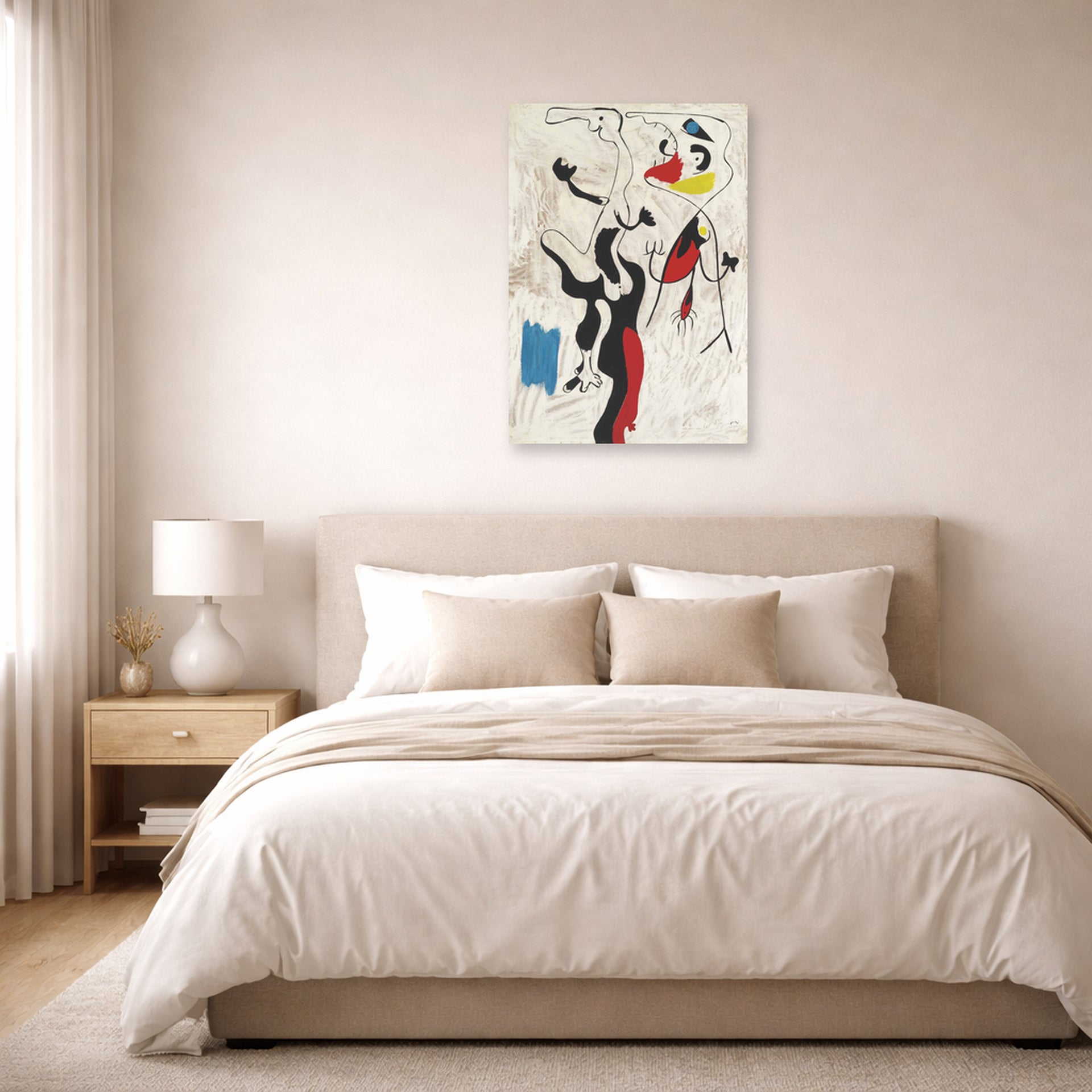 Unframed poster print of Joan Miró's 'Man and Woman' displayed on a wall in a bedroom