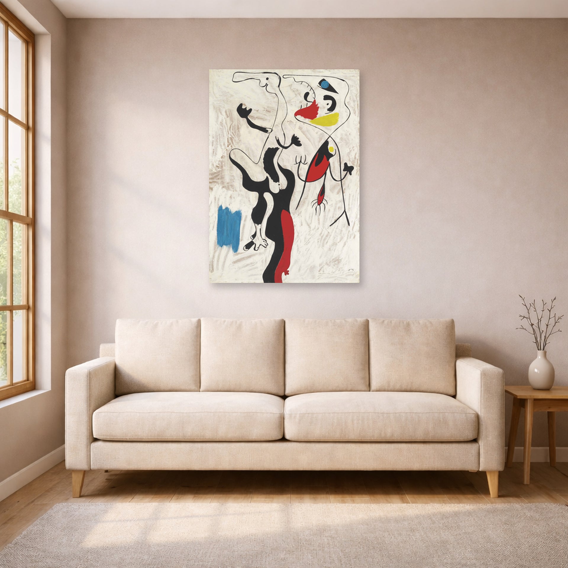 Unframed poster print of Joan Miró's 'Man and Woman' displayed on a wall in a living room