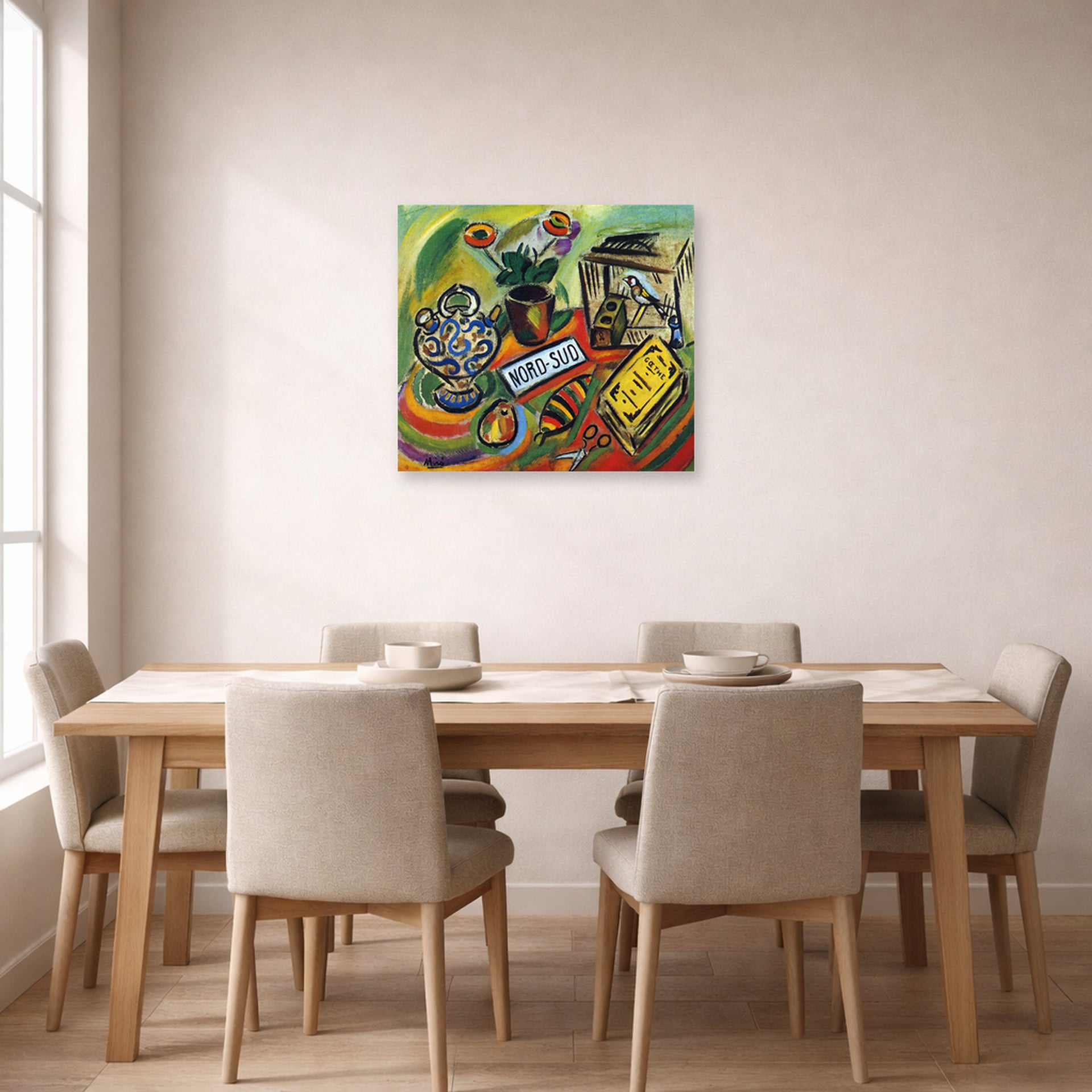 Unframed poster print of Joan Miró's 'North South' displayed on a wall in a dining room