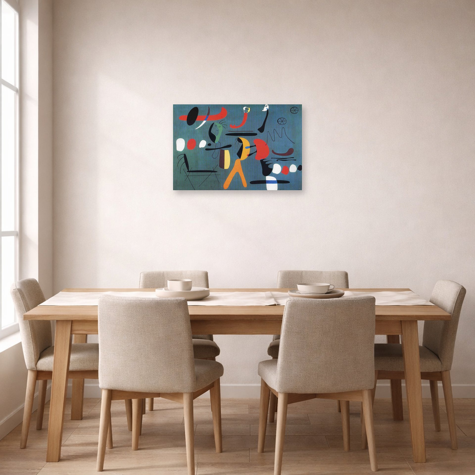 Unframed poster print of Joan Miró's 'Painting 1925-1964' displayed on a wall in a dining room