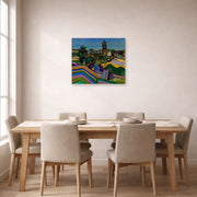 Unframed poster print of Joan Miró's 'Prades, the Village' displayed on a wall in a dining room