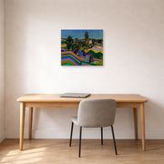 Unframed poster print of Joan Miró's 'Prades, the Village' displayed on a wall in a office