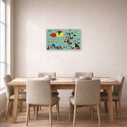 Unframed poster print of Joan Miró's 'Soiree Snob Chez La Princesse' displayed on a wall in a dining room
