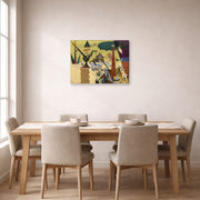 Gallery-wrapped canvas print of Joan Miró's 'The Tilled Field' displayed on a wall in a dining room