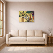 Unframed poster print of Joan Miró's 'The Tilled Field' displayed on a wall in a living room