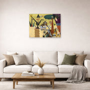 Unframed poster print of Joan Miró's 'The Tilled Field' displayed on a wall in a living room