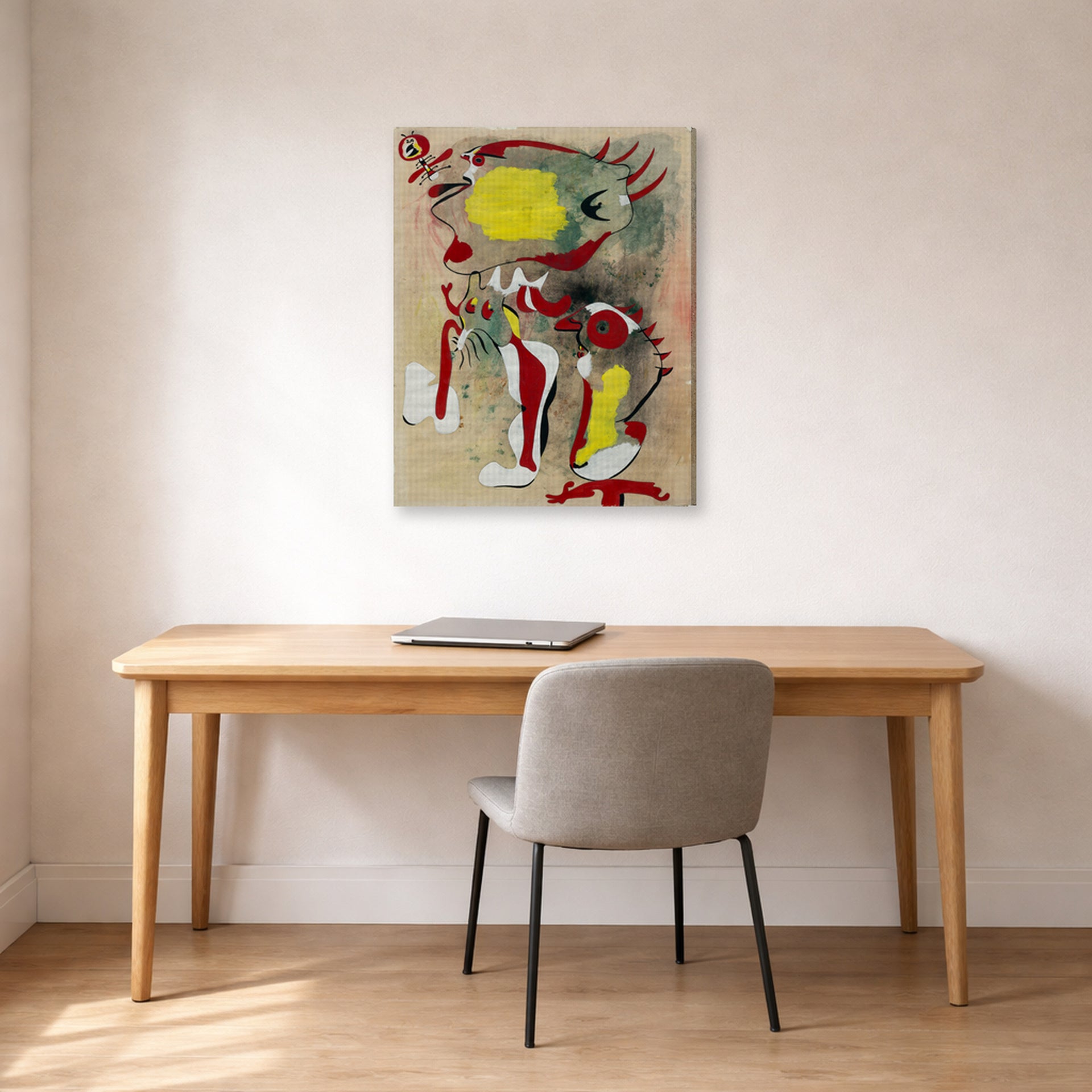 Gallery-wrapped canvas print of Joan Miró's 'Two Figures and a Dragonfly' displayed on a wall in a office