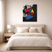 Gallery-wrapped canvas print of Joan Miró's 'Woman, Bird' displayed on a wall in a bedroom