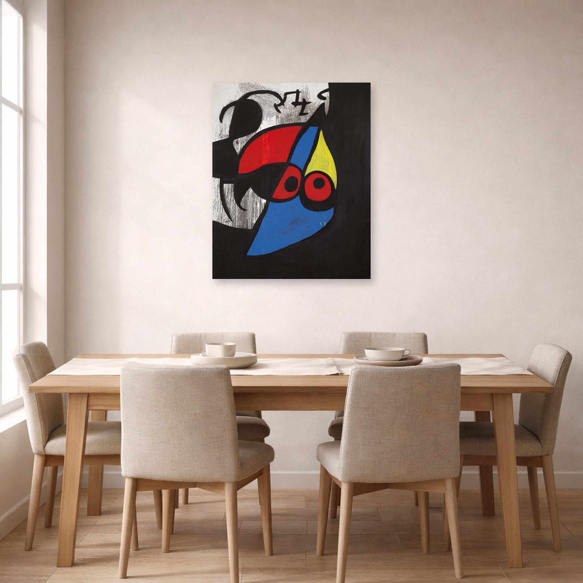 Unframed poster print of Joan Miró's 'Woman, Bird' displayed on a wall in a dining room