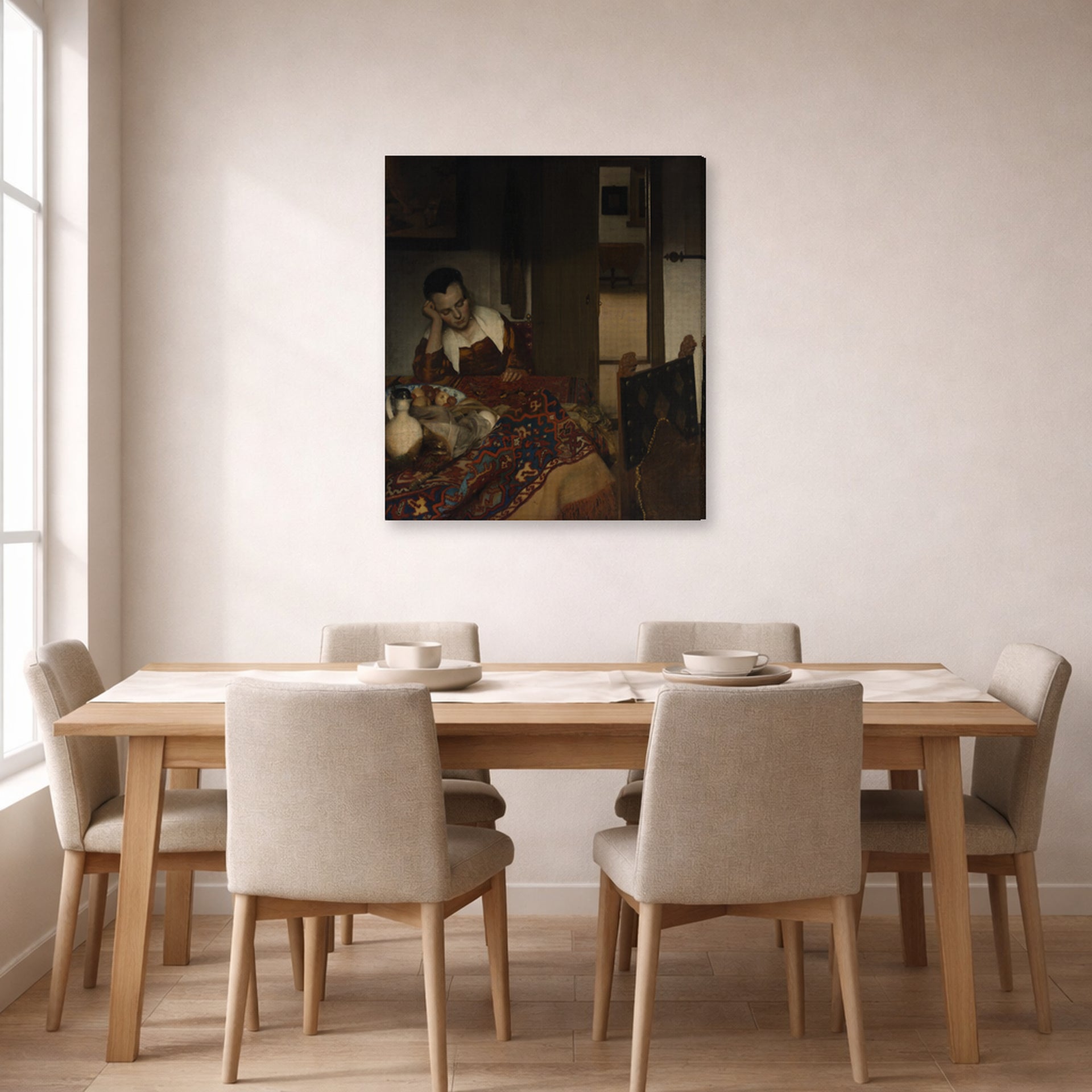 Gallery-wrapped canvas print of Johannes Vermeer's A Maid Sleep displayed on a wall in a dining room