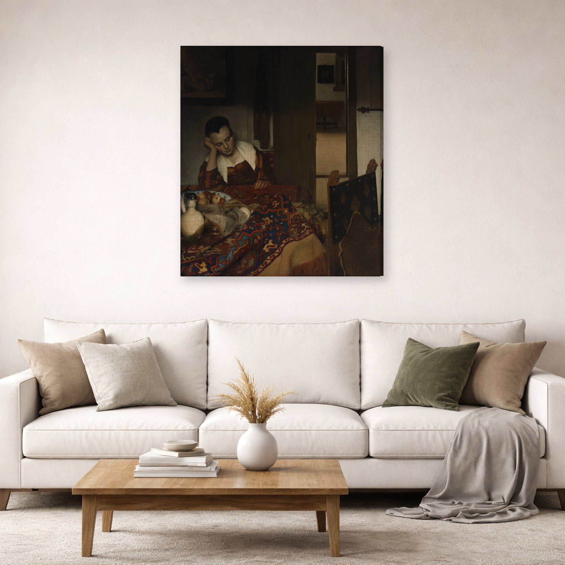 Gallery-wrapped canvas print of Johannes Vermeer's A Maid Sleep displayed on a wall in a living room