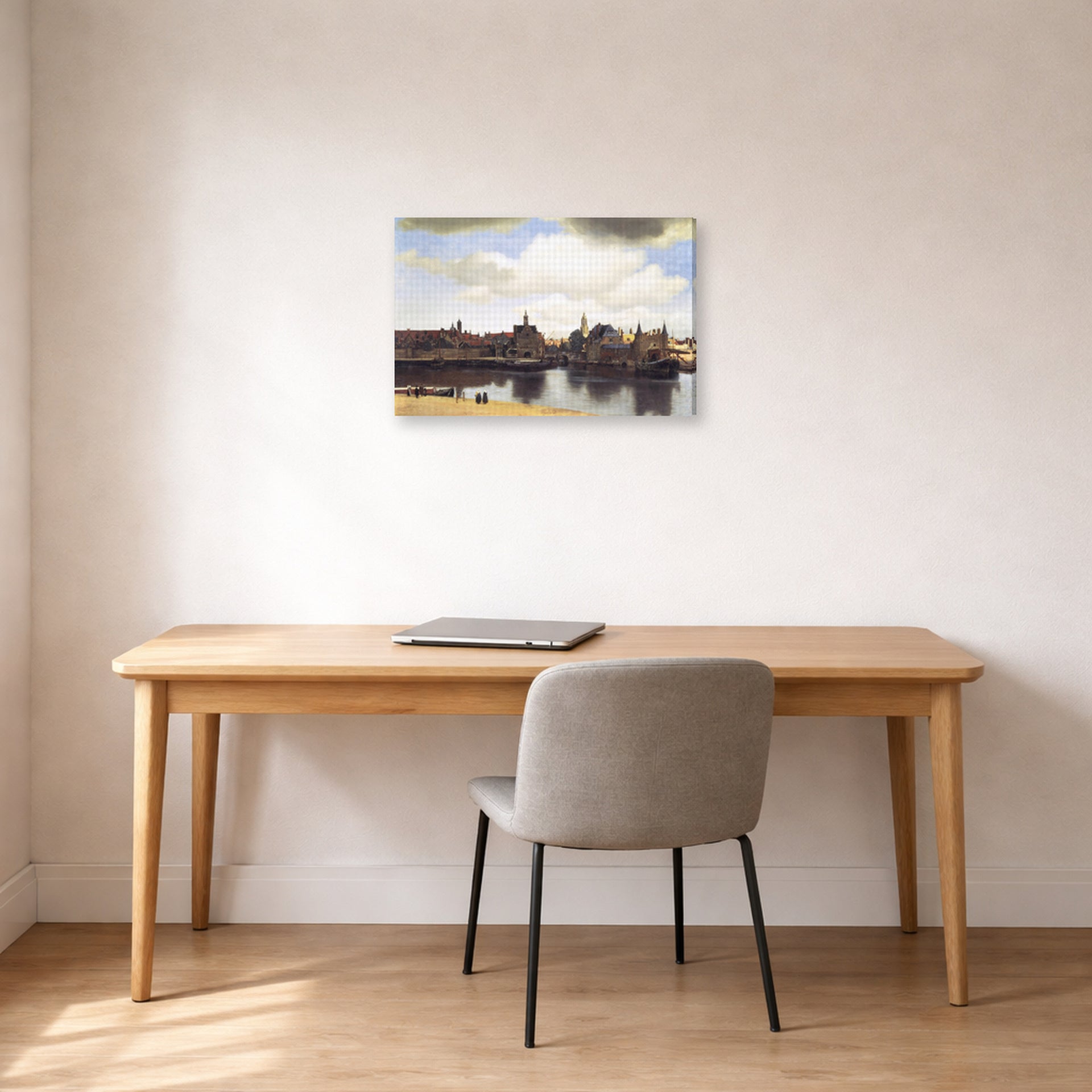 Gallery-wrapped canvas print of Johannes Vermeer's View of Delft displayed on a wall in a office