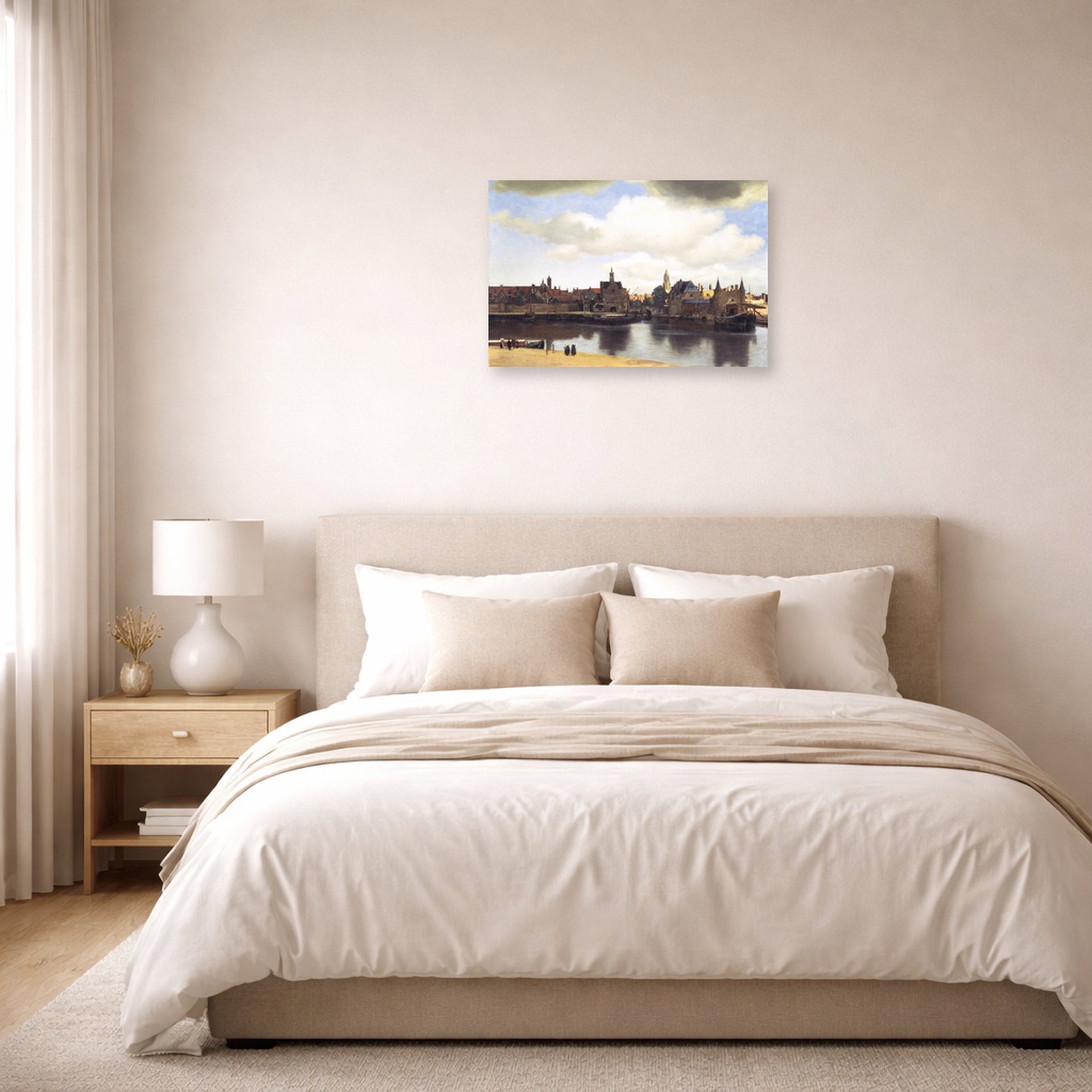 Unframed poster print of Johannes Vermeer's View of Delft displayed on a wall in a bedroom