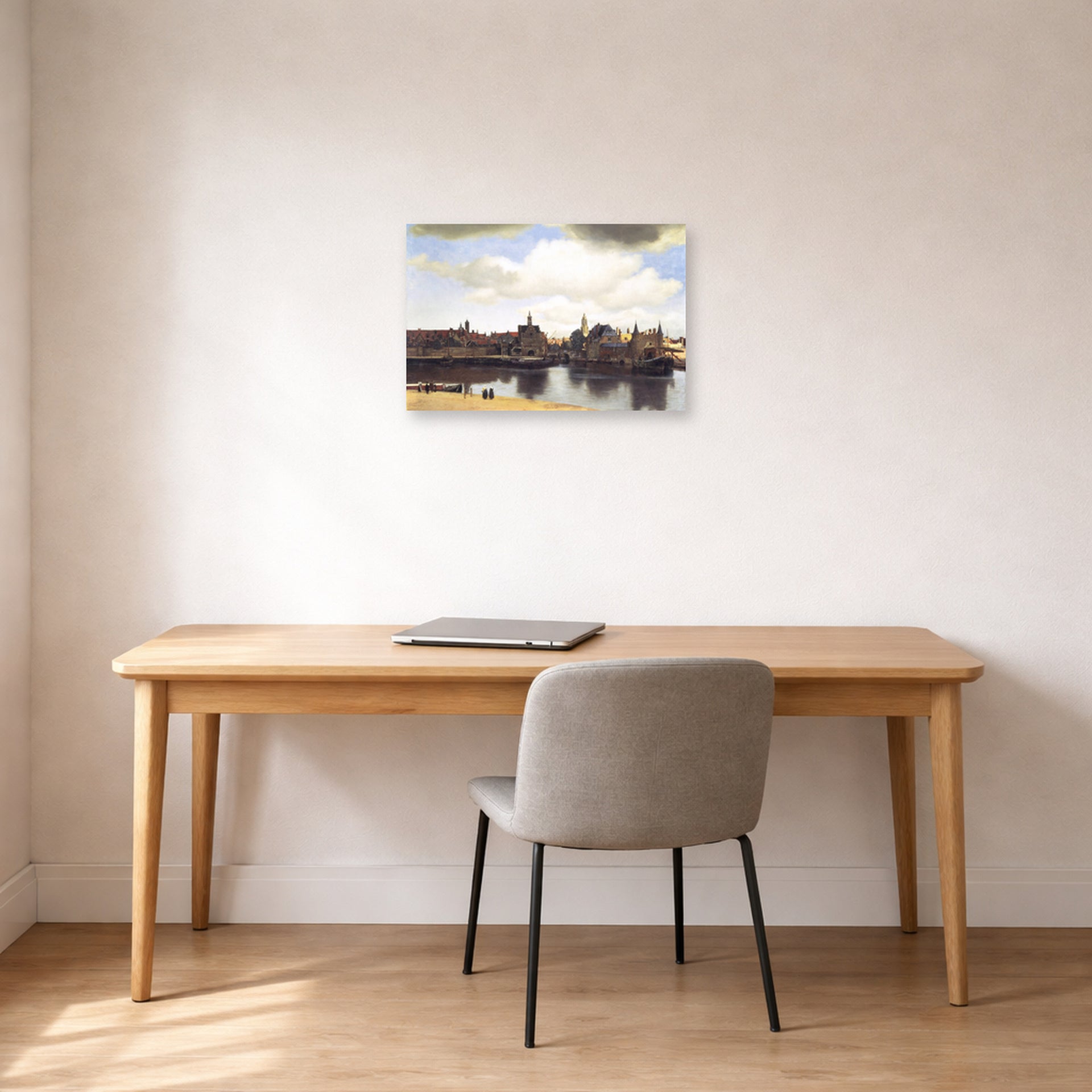 Unframed poster print of Johannes Vermeer's View of Delft displayed on a wall in a office