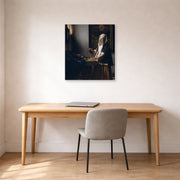 Gallery-wrapped canvas print of Johannes Vermeer's Woman Holding a Balance displayed on a wall in a office