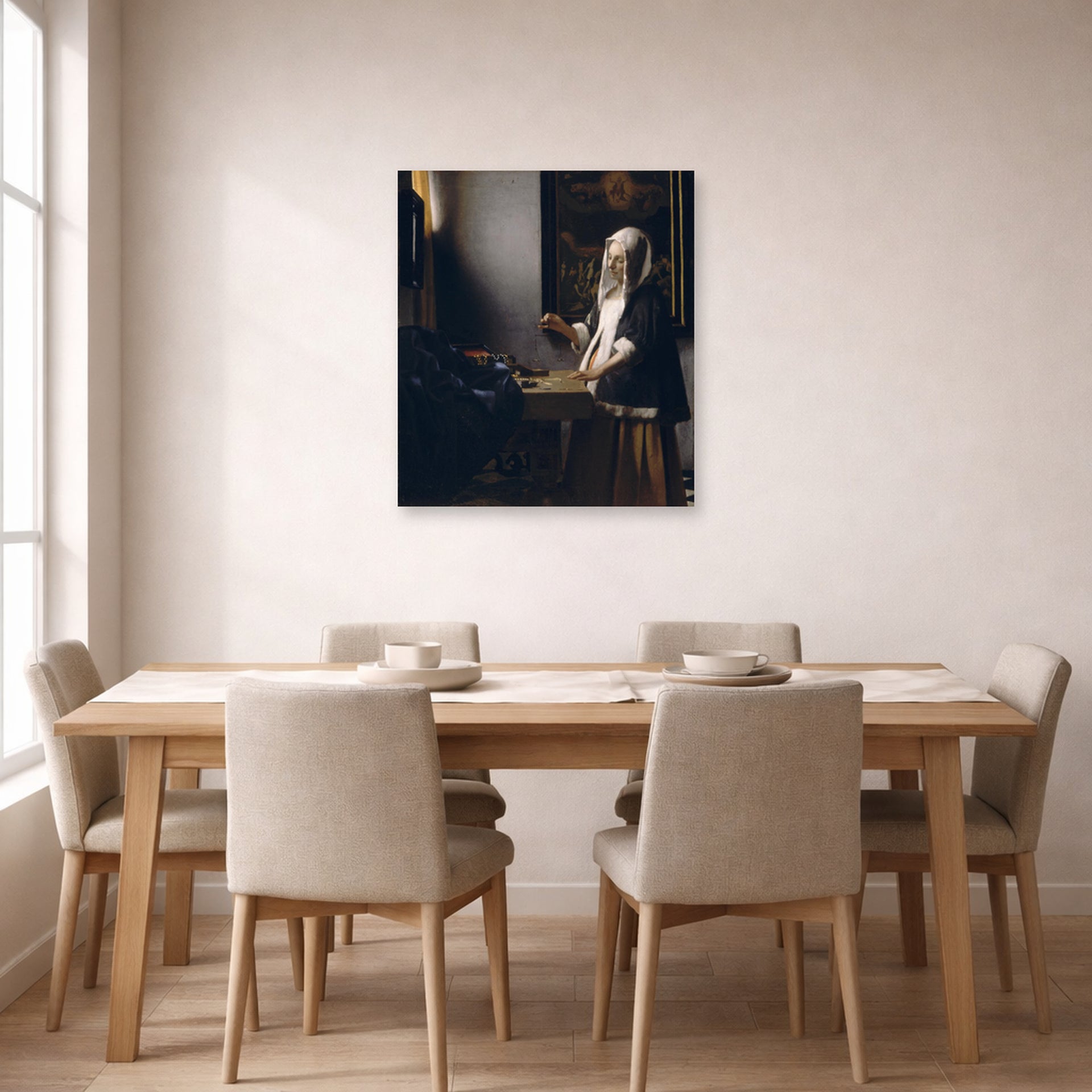 Unframed poster print of Johannes Vermeer's Woman Holding a Balance displayed on a wall in a dining room