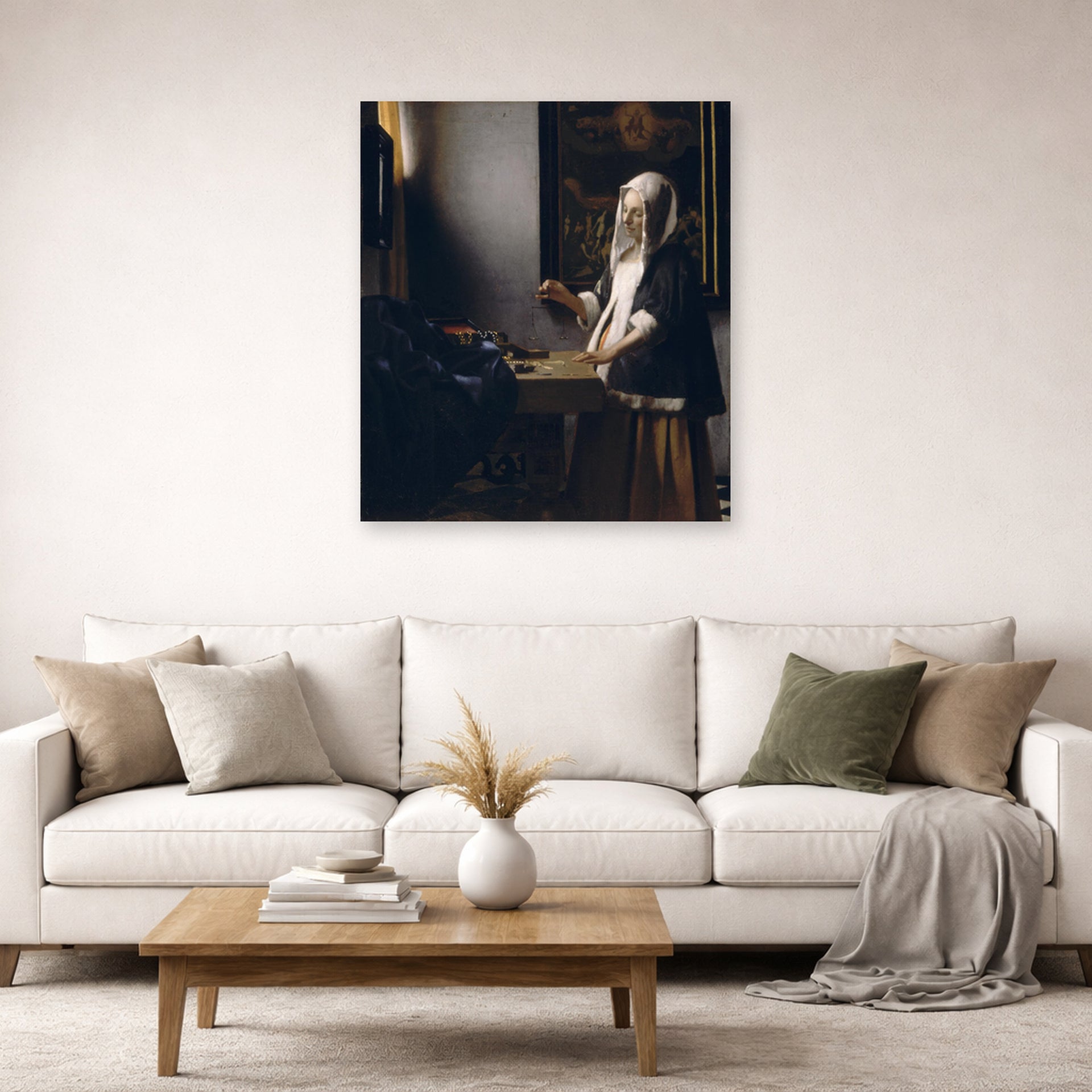 Unframed poster print of Johannes Vermeer's Woman Holding a Balance displayed on a wall in a living room