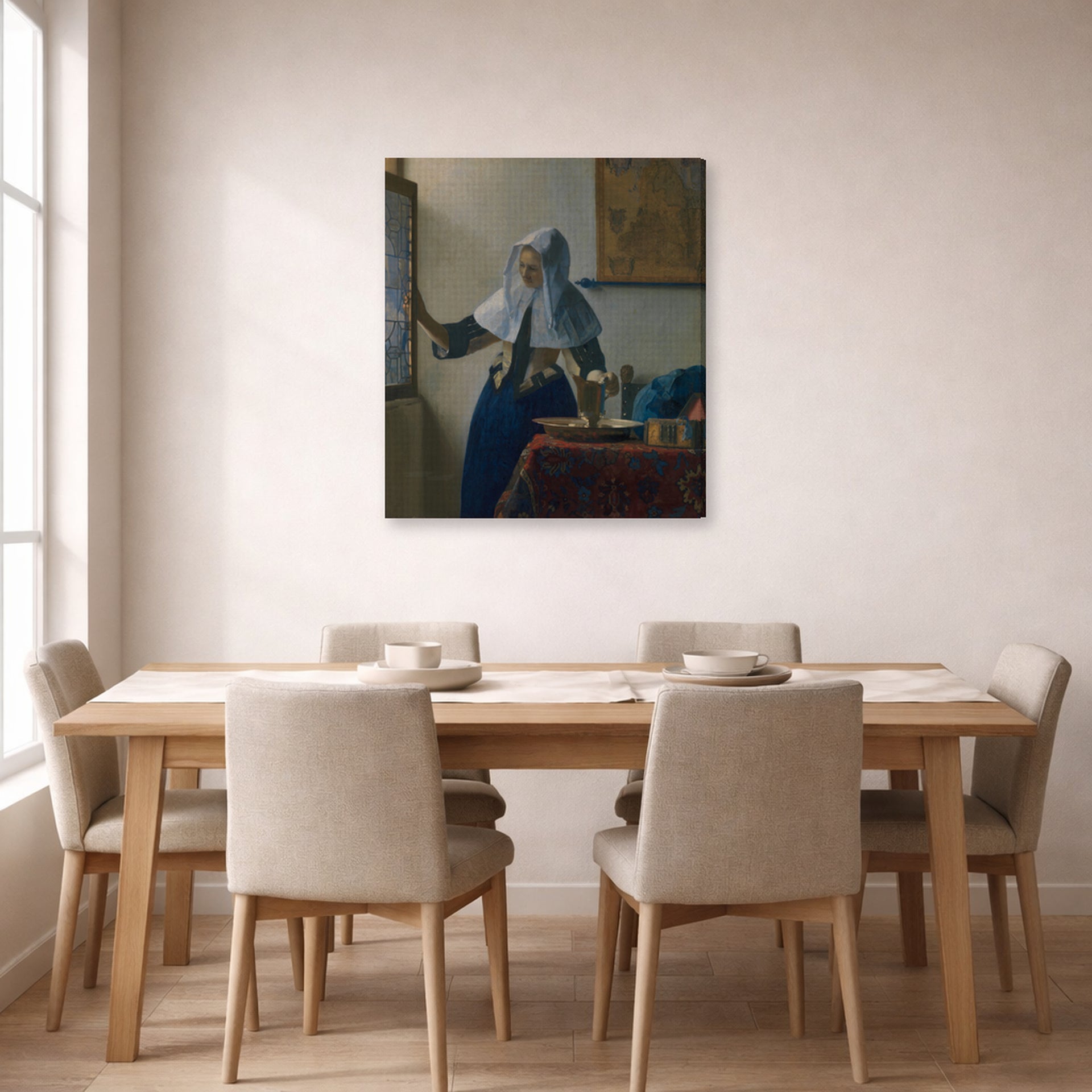 Gallery-wrapped canvas print of Johannes Vermeer's Young Woman with a Water Pitcher displayed on a wall in a dining room