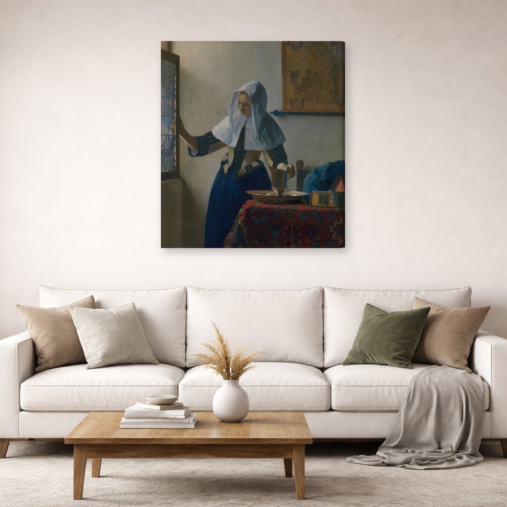 Gallery-wrapped canvas print of Johannes Vermeer's Young Woman with a Water Pitcher displayed on a wall in a living room