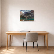 Unframed poster print of John Singer Sargent's Lake O'Hara displayed on a wall in an office